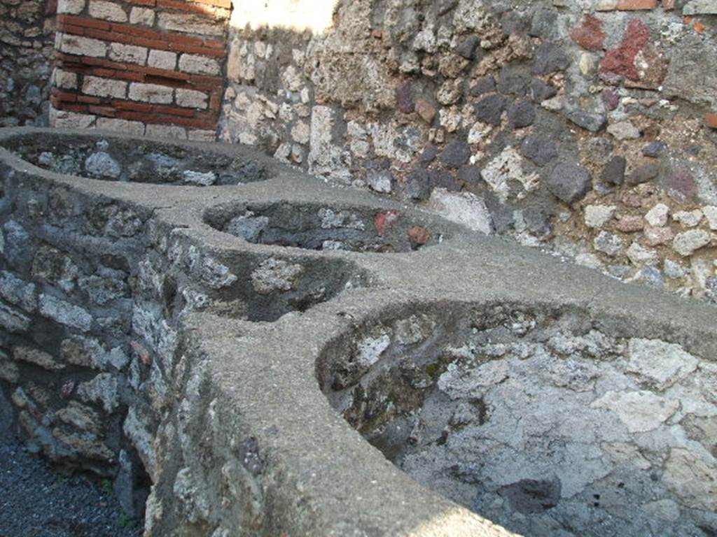 V.1.4 Pompeii. December 2006. Boilers or kettles on east side.