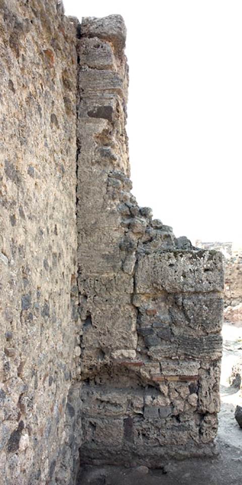 V.1.13 Pompeii. Post 2008.  
West wall in south-west corner of rear room “f”. Photo by Hans Thorwid. 
Photo courtesy of the Swedish Pompeii Project.
