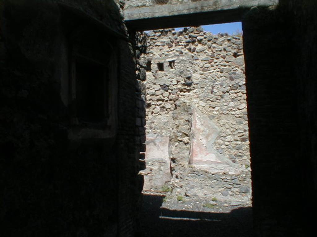V.1.28 Pompeii. September 2004. Looking east along fauces to atrium.