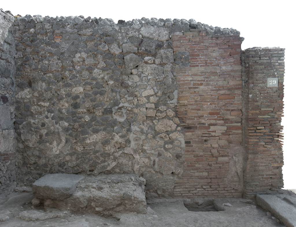 V.1.29 Pompeii. c.2011. South wall with hearth/bench. Photo by Hans Thorwid.
Photo courtesy of The Swedish Pompeii Project.
