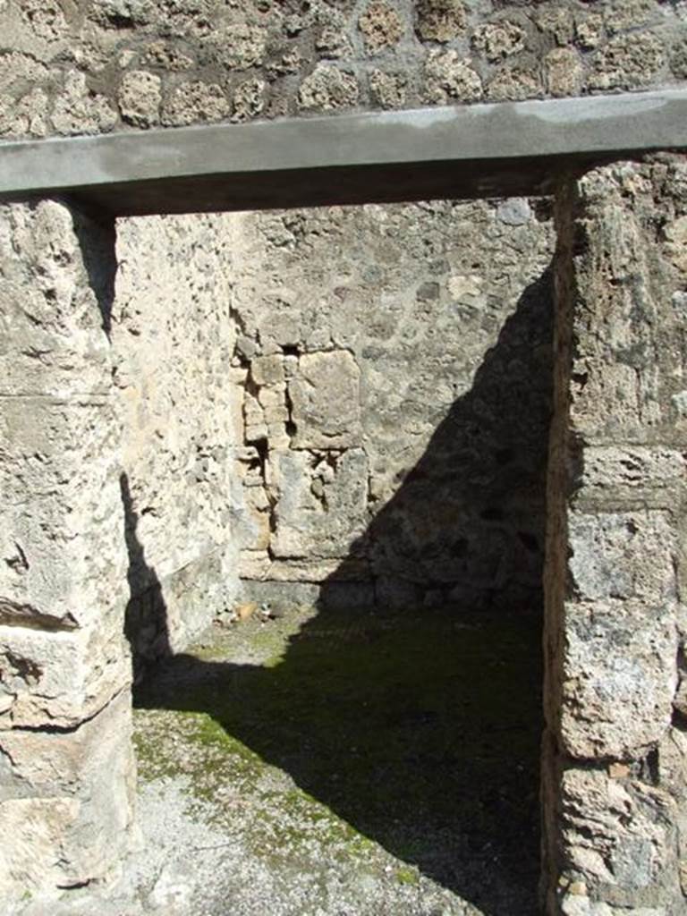 V.2.1 Pompeii. March 2009. Doorway to room 3, cubiculum.
According to BdI, this was room s and did not have anything other than rough plaster.
