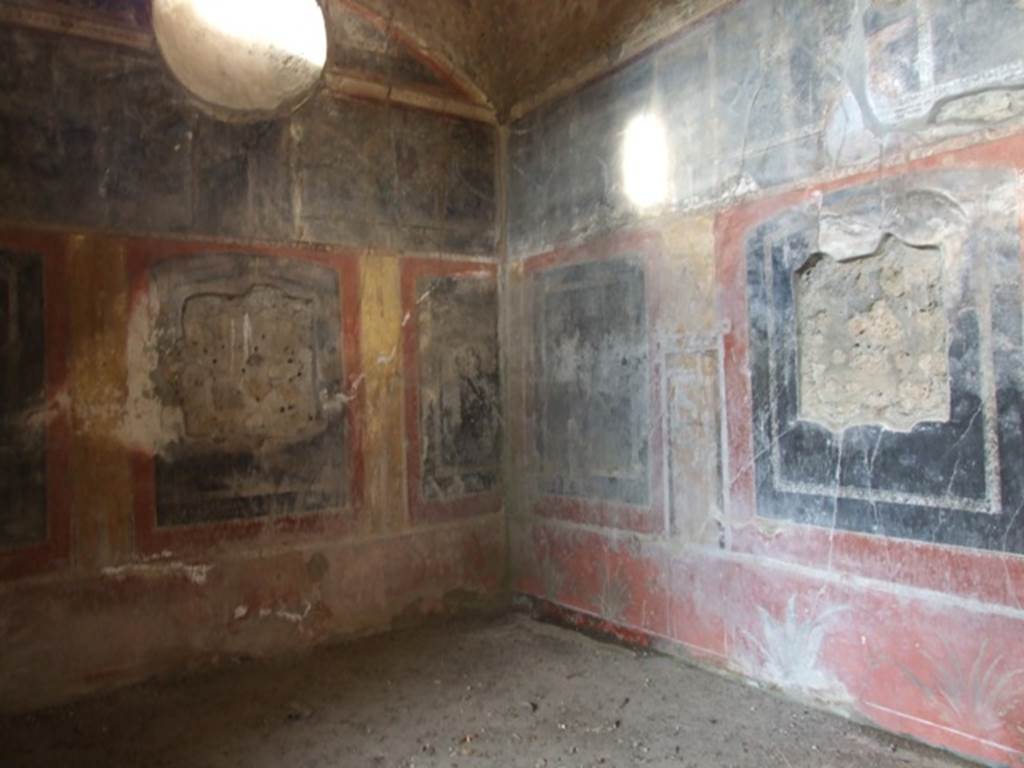 V.2.4 Pompeii. December 2007. Room 15, triclinium, west wall, north-west corner and north wall.