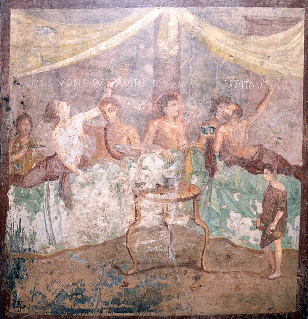 V.2.4 Pompeii. Room 15, painting of banqueting scene from north wall of triclinium showing the Commencement. 
The guests are reclining at table and a boy brings in dishes.
Now in Naples Archaeological Museum. Inventory number 120031. Photo courtesy of Giuseppe Ciaramella taken December 2019.
