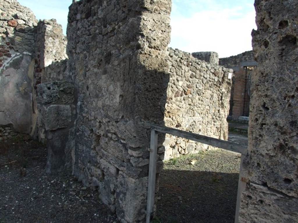 V.2.10 Pompeii. December 2007.  South-east corner of atrium showing part of south wall of room 6 and looking into V.2.11.
