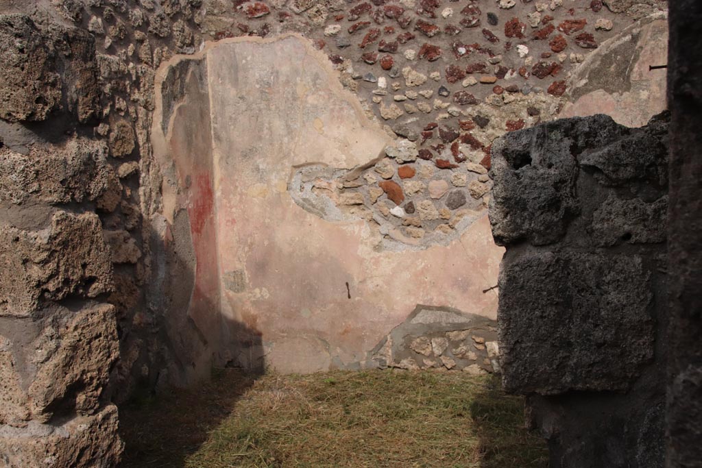V.2.10 Pompeii. October 2022. Doorway to room 6, looking north-east. Photo courtesy of Klaus Heese.

