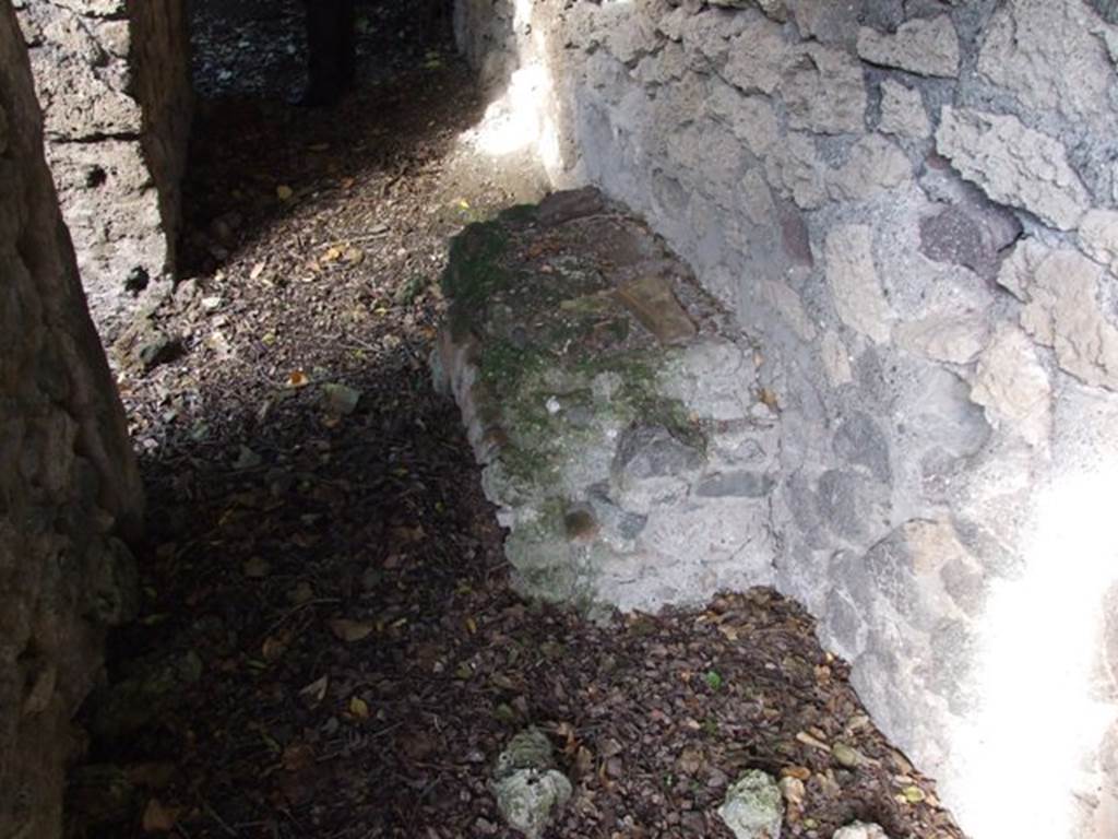 V.2.15 Pompeii. December 2007. Corridor 11a with stone bench or base in corridor.