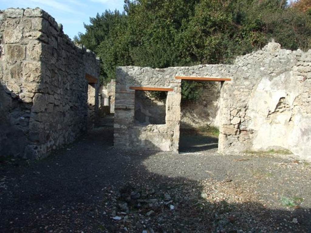 V.2.15 Pompeii. December 2007. Atrium, looking north to corridor to rear and doorway to room 2, on right.