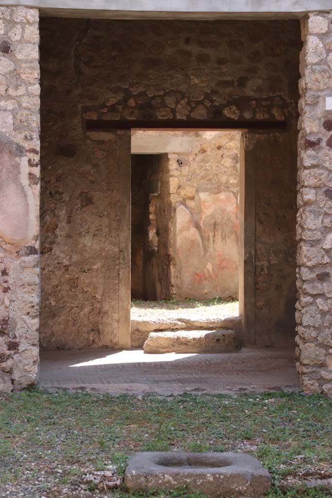 V.2.h Pompeii. September 2021. 
Looking south across impluvium in atrium ‘d’, towards tablinum (f). Photo courtesy of Klaus Heese.
