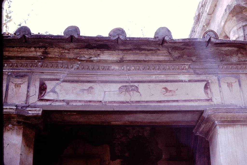 V.2.i Pompeii. 1964. 
Room 23, Rhodian peristyle on west side showing painted decoration and difference in height and style of columns. 
Photo by Stanley A. Jashemski.
Source: The Wilhelmina and Stanley A. Jashemski archive in the University of Maryland Library, Special Collections (See collection page) and made available under the Creative Commons Attribution-Non Commercial License v.4. See Licence and use details.
J64f0905
