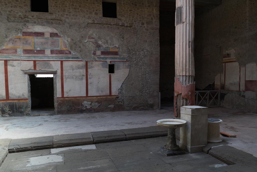 V.2.i Pompeii. March 2023. 
Room 1, looking east across atrium towards doorway to room 4, on left, and to east ala 5, in south-east corner, on right.
Photo courtesy of Johannes Eber.
