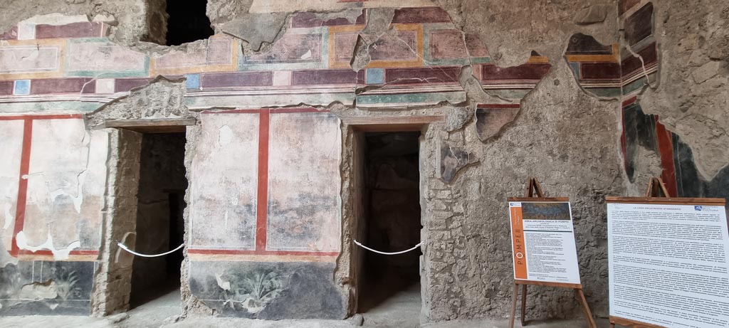V.2.i Pompeii. December 2023. Atrium, looking towards doorways in west wall at north end. Photo courtesy of Miriam Colomer.