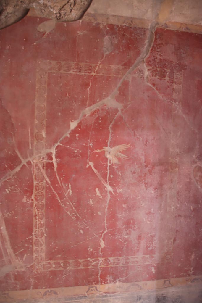 V.2.i Pompeii.  October 2023. 
Corridor 10, painted panel at south end of east wall. Photo courtesy of Klaus Heese.
