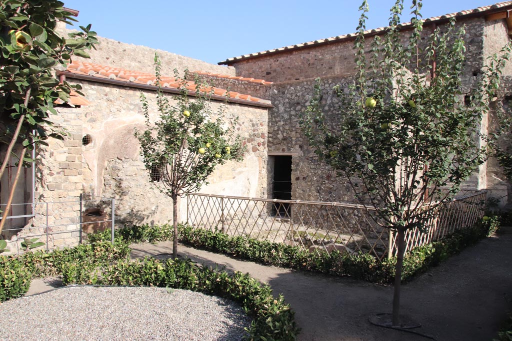 V.2.i Pompeii.  October 2023. Garden 12, looking south-east towards cold plunge pool and doorway to room 14. Photo courtesy of Klaus Heese.