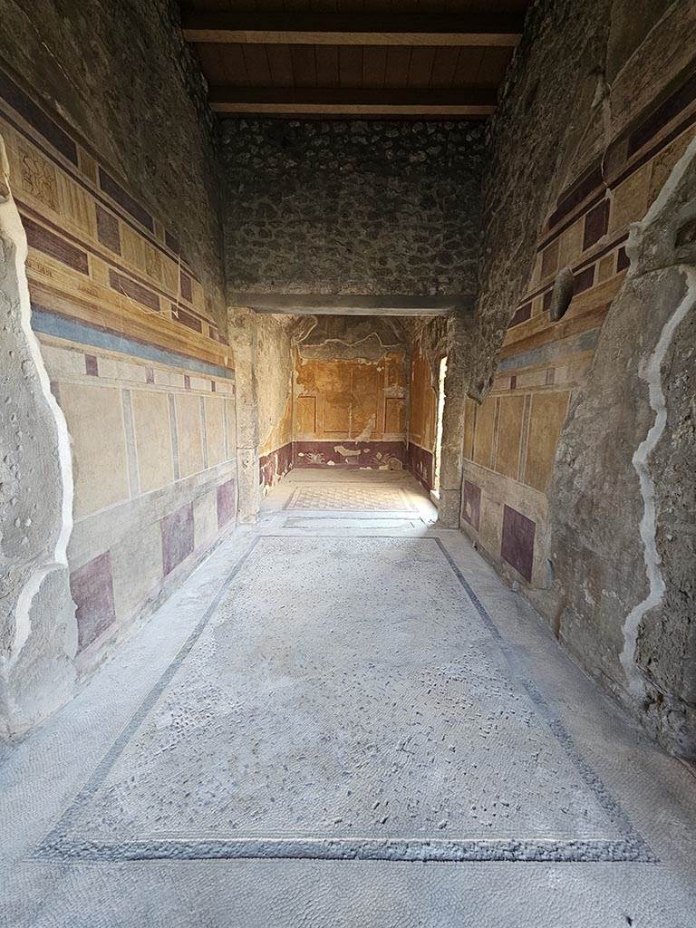 V.2.i Pompeii. November 2024. 
Room 14, looking west across flooring of antecamera towards apodyterium or dressing room.
Photo courtesy of Annette Haug.
