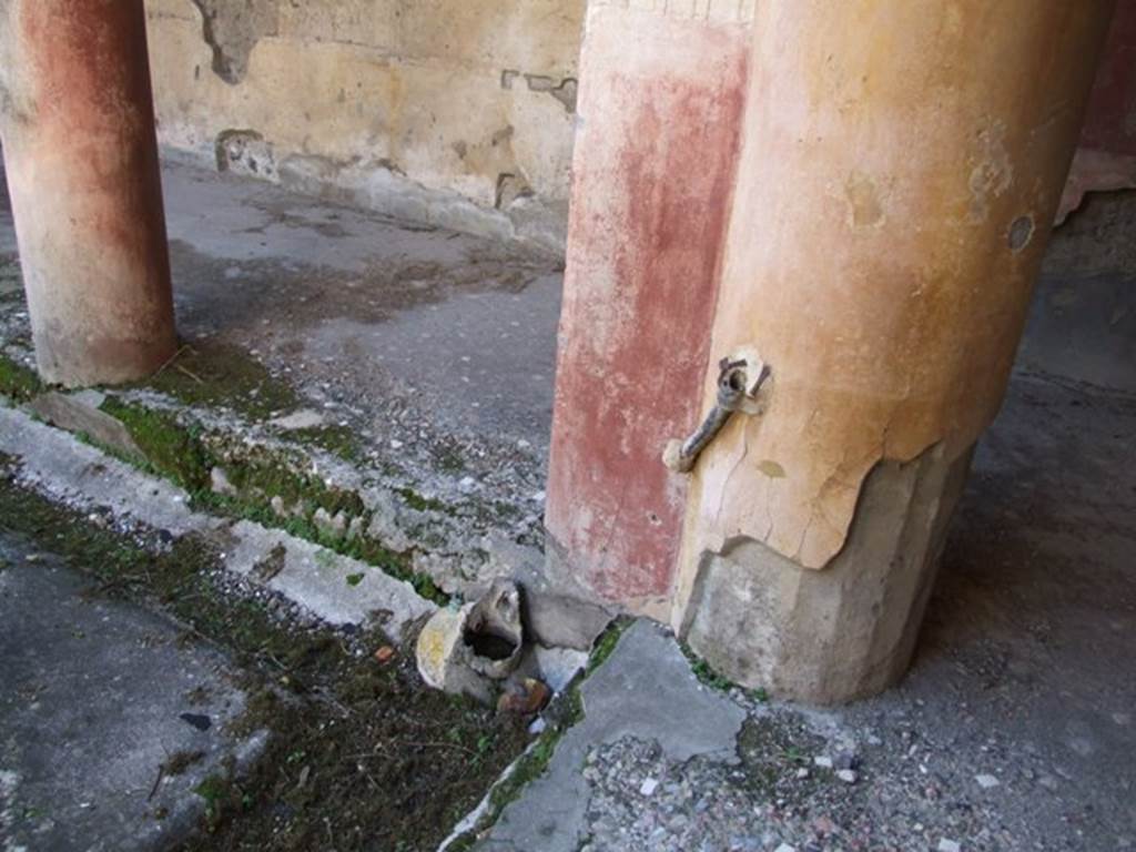 V.2.i Pompeii. December 2007. Room 23, details of lead pipe work in north-west corner of Rhodian peristyle