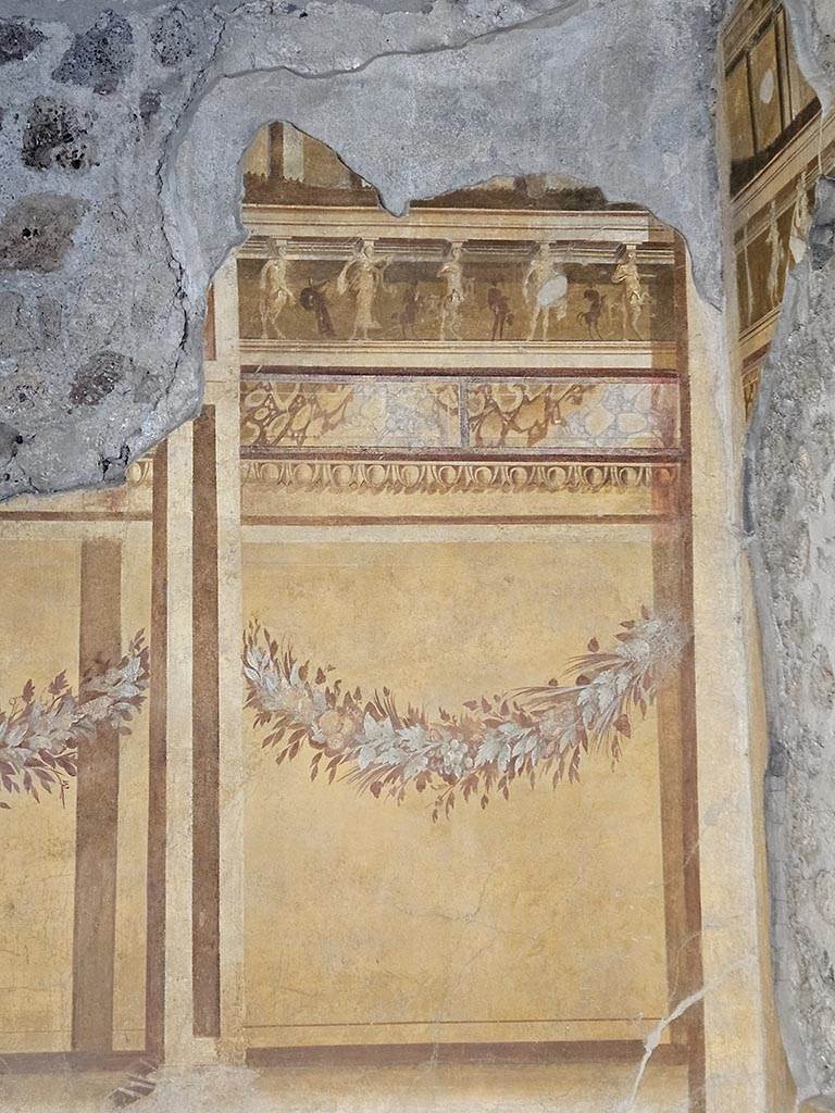 V.2.i Pompeii. November 2024. 
Room 19, detail from south wall at west end in south-west corner. Photo courtesy of Annette Haug.
