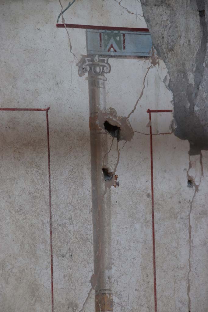V.2.Pompeii. Casa di Orione. September 2021. 
Room A13, detail of painted decoration from centre of east wall of south ala. Photo courtesy of Klaus Heese.


