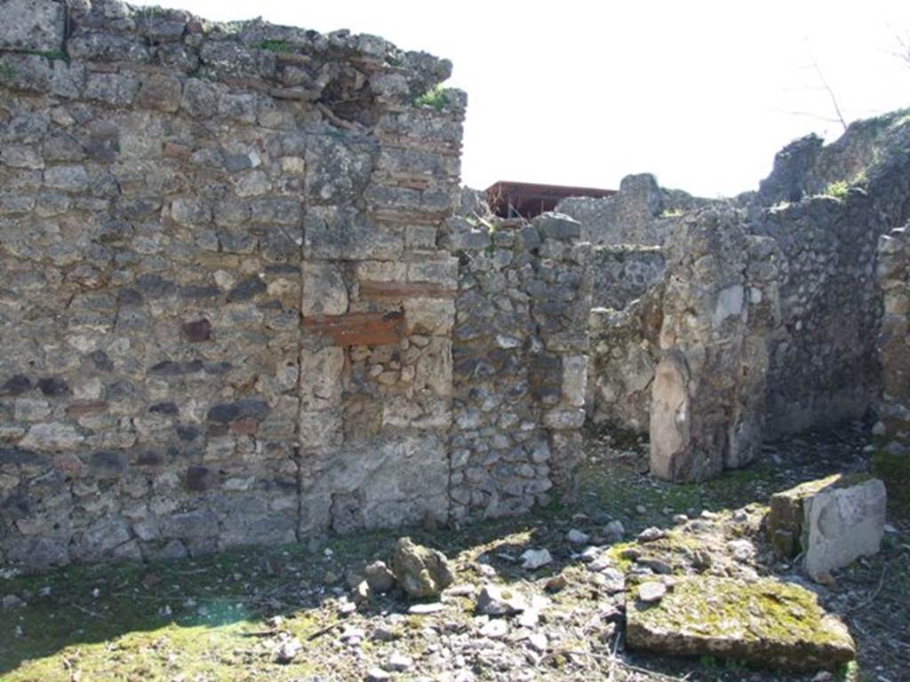 V.3.10 Pompeii. March 2009. South wall of atrium with doorway to cubiculum.