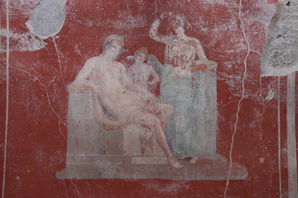 V.3 Pompeii. Casa del Giardino. September 2021.
Room 3, detail of painting of Venus with a male figure (perhaps Adonis or Paris) and with cupid Eros, from centre of east wall.
Photo courtesy of Klaus Heese.