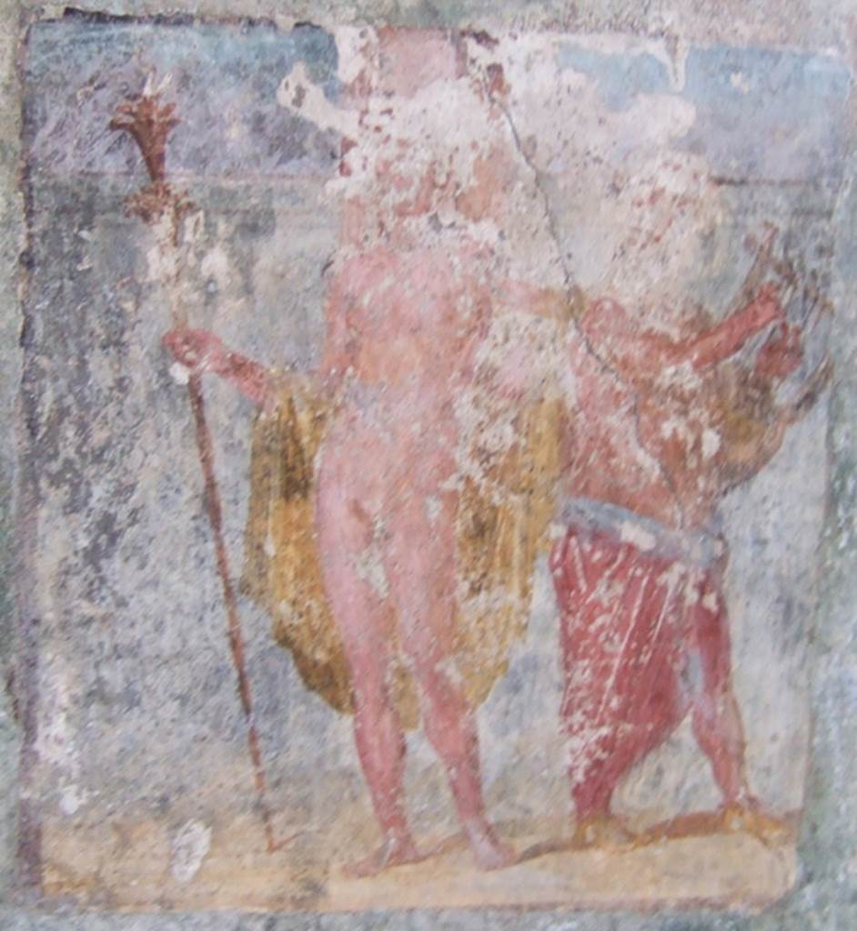 V.4.a Pompeii. May 2006. Summer triclinium, east wall. Close up of the wall painting of Dionysus (Bacchus) accompanied by Silenus playing the lyre. See Nappo, S., 1998. Pompeii: Guide to the lost City. London: Weidenfield and Nicolson. (p. 126).