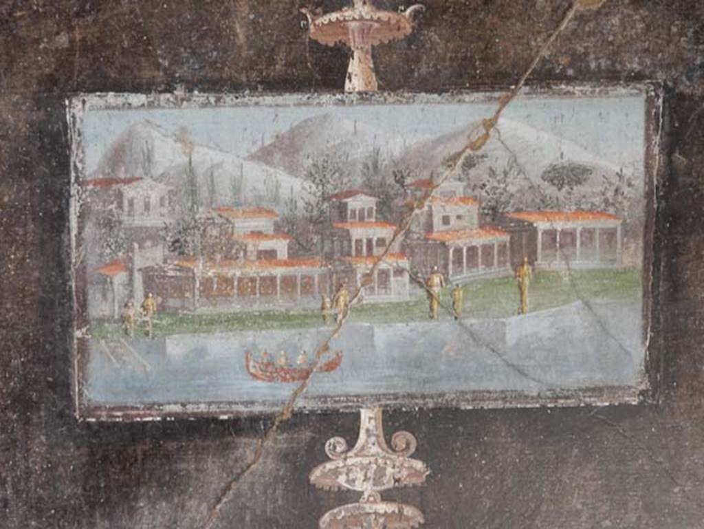 V.4.a Pompeii. May 2015. South wall of tablinum. Wall painting of architectural landscape with waterfront and boat.  Photo courtesy of Buzz Ferebee.

