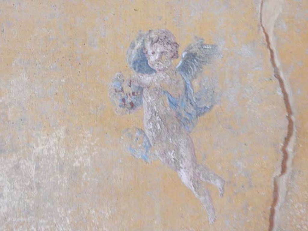 V.4.a Pompeii. May 2015. West end of south wall of cubiculum to right of tablinum.
Detail of figure to right of painting of Pero suckling her father Micone. Photo courtesy of Buzz Ferebee.
