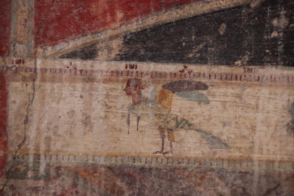 V.4.a Pompeii. October 2023. Room ‘g’, detail from upper west wall above central painting, north end. Photo courtesy of Klaus Heese.