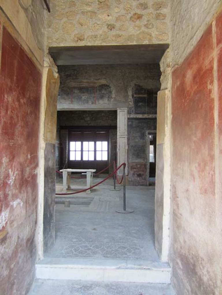 V.4.a Pompeii. March 2012. Looking east into atrium from entrance corridor, towards tablinum. Photo courtesy of Marina Fuxa.
