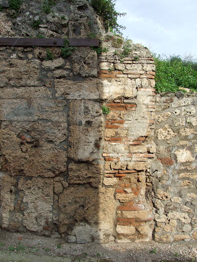 V.6.1 Pompeii. December 2006. This pillar, on north side of entrance doorway, used to have a painting of Mercury.  
See Frhlich, T., 1991, Lararien und Fassadenbilder in den Vesuvstdten. Mainz: von Zabern.  (F34: p.318).
Below the painting of Mercury was the graffito CIL IV 6648. No longer visible.
See Varone, A. and Stefani, G., 2009. Titulorum Pictorum Pompeianorum, Rome: Lerma di Bretschneider, (p.305-6).
According to Epigraphik-Datenbank Clauss/Slaby (See www.manfredclauss.de), it read:
L(ucium)  C(eium)  S(ecundum)  II vir(um)    [CIL IV 6648]
