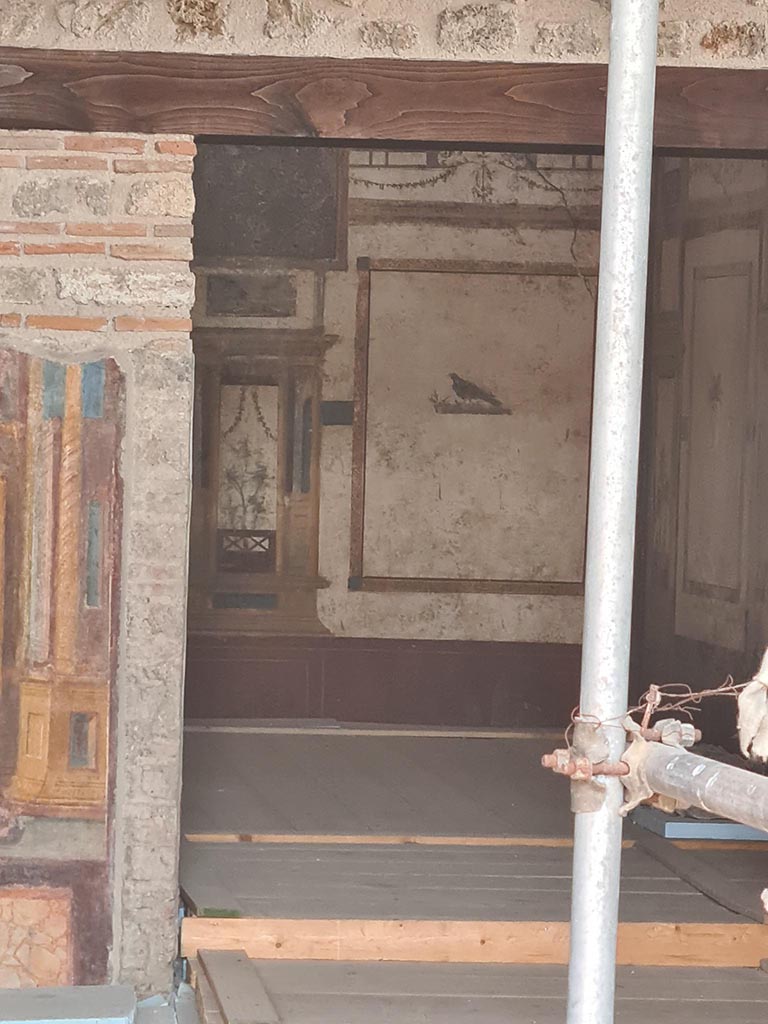 V.6.12 Pompeii. October 2024.  
Looking east from entrance corridor towards doorway to room 35, at rear of atrium.  
Photo courtesy of Klaus Heese.
