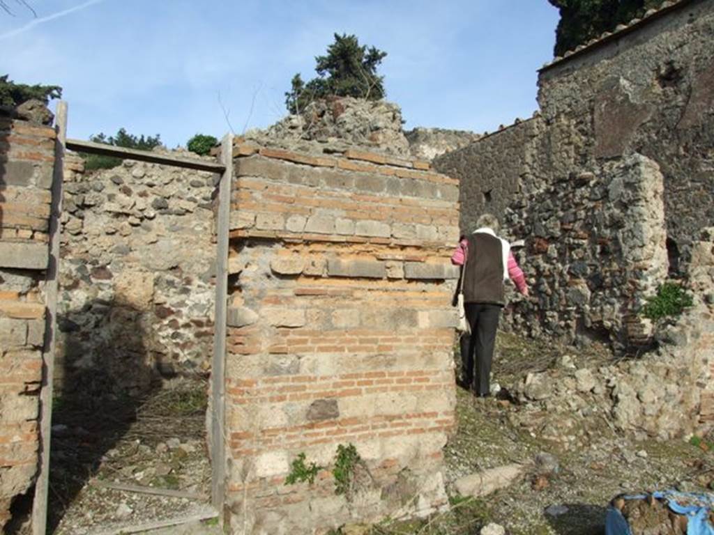 VI.1.4 Pompeii. December 2007. Doorways to two of the three rooms on north wall.