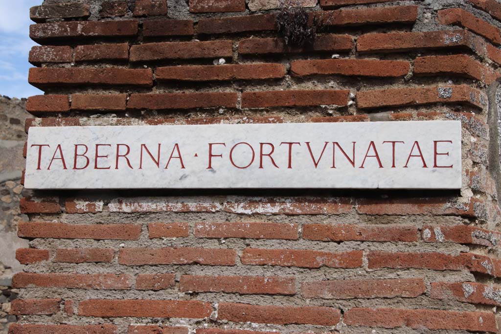 VI.3.19 Pompeii. October 2020. Taberna Fortunatae name plaque on pilaster between VI.3.19 and VI.3.20. Photo courtesy of Klaus Heese.