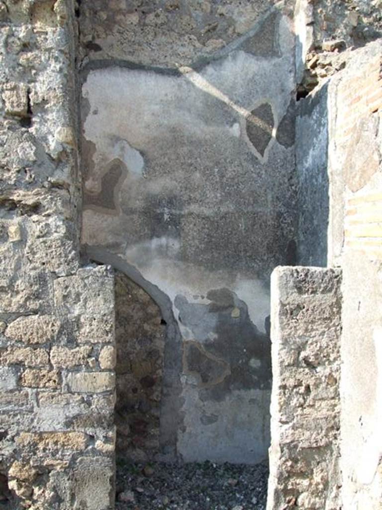 VI.7.3 Pompeii. March 2009. Room 5, tablinum with cupboard in north wall.