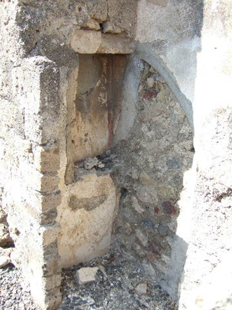 VI.7.3 Pompeii. March 2009. Room 5, tablinum. Recess on west side of cupboard.