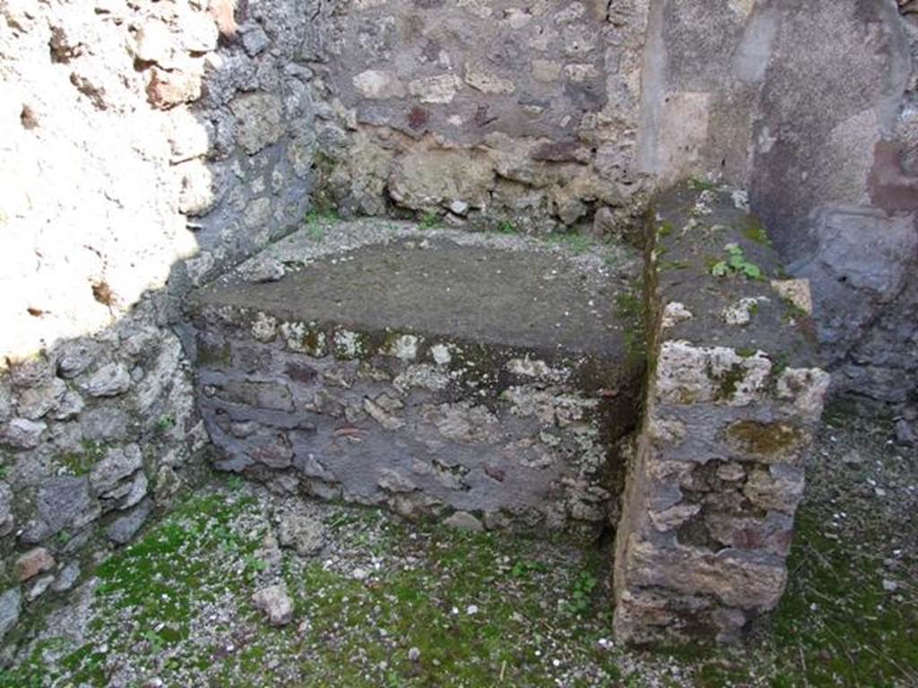 VI.7.3 Pompeii. March 2009. Room 7, kitchen, bench or hearth.