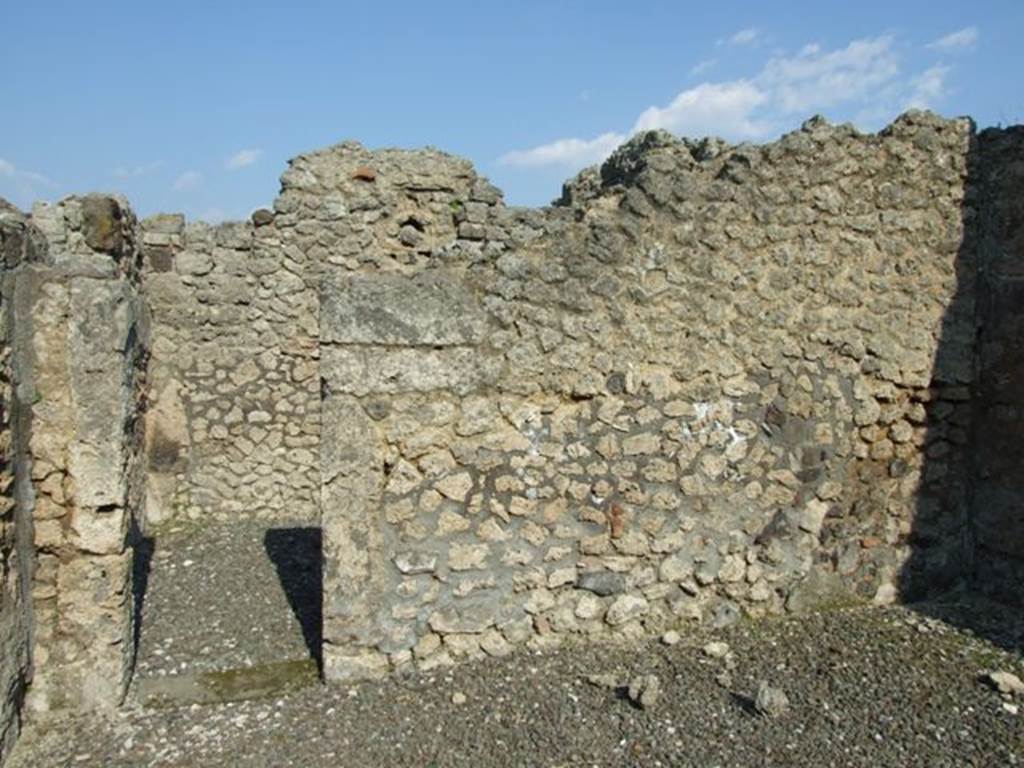 VI.7.3 Pompeii.  March 2009.  Room 9.  Oecus. East wall with Doorway to Room 8.