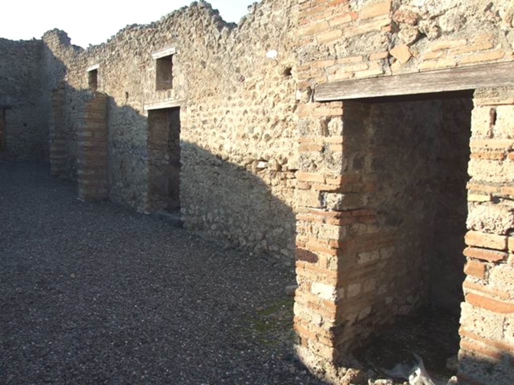 VI.7.15 Pompeii. December 2007. North side from entrance doorway.
According to Fiorelli, Eschebach and Hobson, on the right, is the doorway into the latrine. See Pappalardo, U., 2001. La Descrizione di Pompei per Giuseppe Fiorelli (1875). Napoli: Massa Editore. (p.58)
See Eschebach, L., 1993. Gebäudeverzeichnis und Stadtplan der antiken Stadt Pompeji. Köln: Böhlau. (p.179) See Hobson, B. 2009. Pompeii, Latrines and Down Pipes. Oxford, Hadrian Books, (p.227) According to Hobson, in this latrine there is one support and one slot, which enabled a latrine to be identified. See Hobson, B., 2009. Latrinae et foricae: Toilets in the Roman World. London; Duckworth. (p.49, and fig 65).
