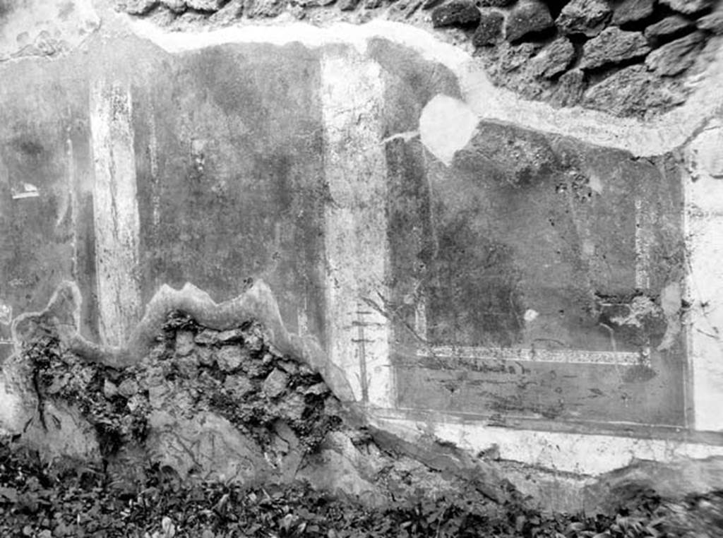 VI.7.16 Pompeii. W.1313. Ambiente 13, west wall with remains of wall decoration.
According to Bragantini, the west wall was described as having yellow panels with a vignette of a bird in both its north and south panel.
It was bordered with two parallel lines, and separated by narrow white panels, with golden candelabra.
See Bragantini, de Vos, Badoni, 1983. Pitture e Pavimenti di Pompei, Parte 2. Rome: ICCD. (p.149, 607161303).
Photo by Tatiana Warscher. Photo © Deutsches Archäologisches Institut, Abteilung Rom, Arkiv. Listed as being from VI.7.15.