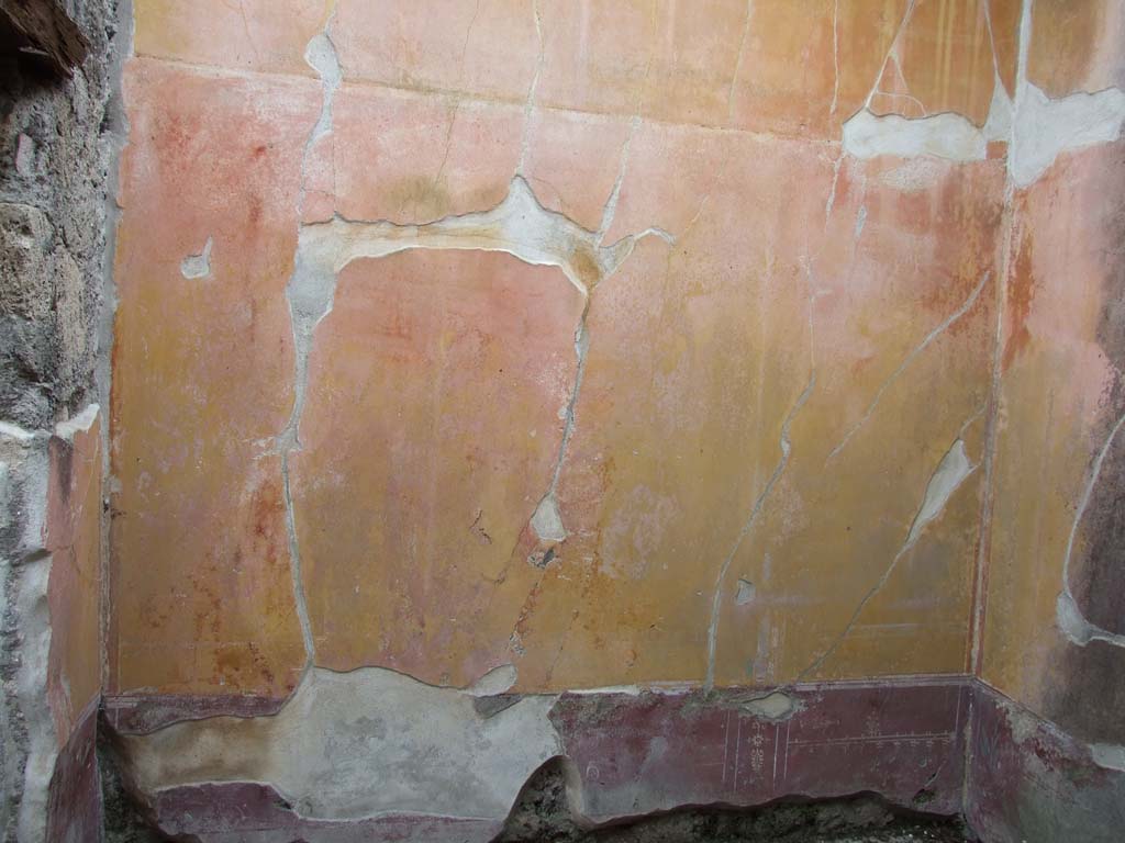VI.7.23 Pompeii.  Wall plaster in one of rooms to north of Atrium.