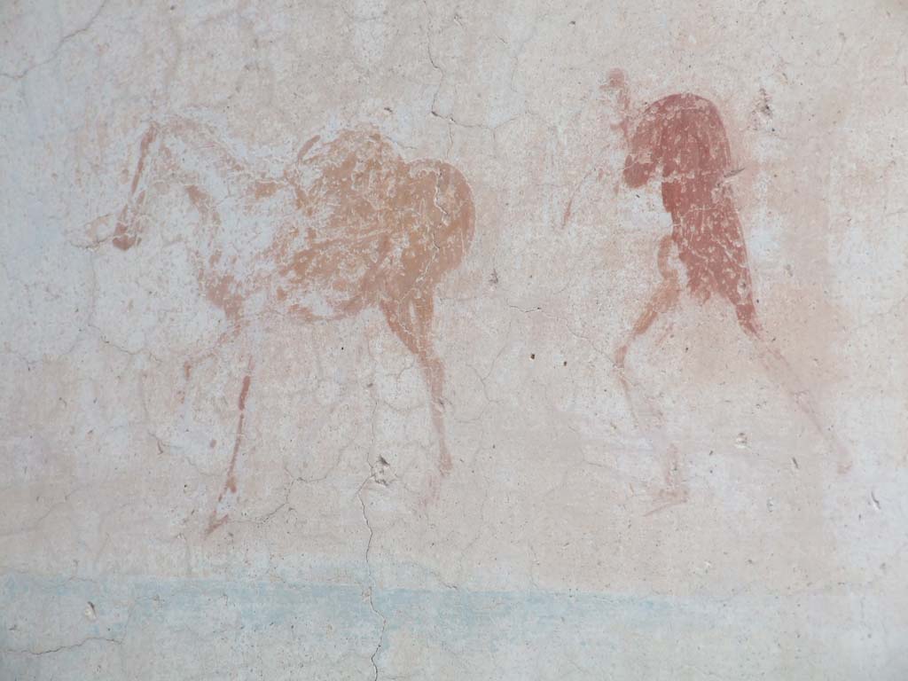 VI.7.23 Pompeii. December 2006. Detail from landscape painting on south wall of bedroom, showing man and horse.