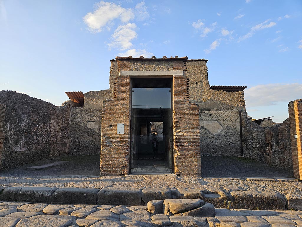 VI.8.5 Pompeii. November 2024. Looking north towards entrance doorway with shop on each side. Photo courtesy of Annette Haug.