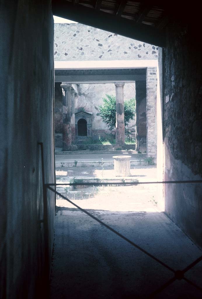 VI.8.5 Pompeii. August 1965. 
Looking north along fauces, across atrium to tablinum and peristyle, at rear. Photo courtesy of Rick Bauer.
