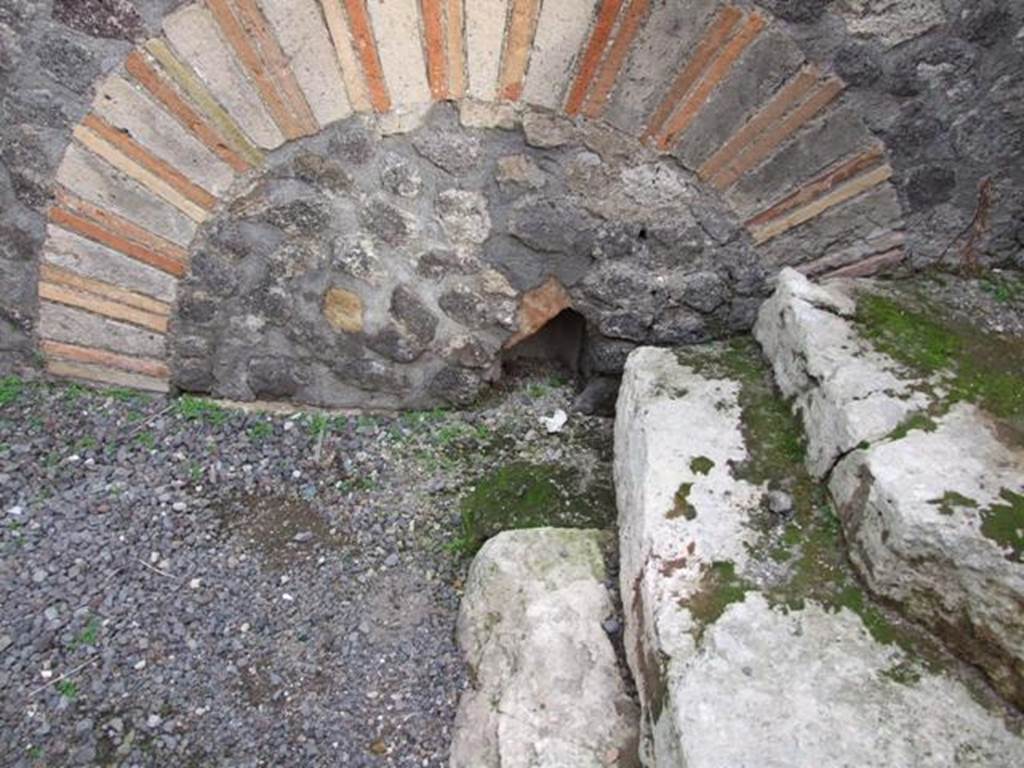 VI.8.11 Pompeii.  Shop.  December 2007.  Remains of steps to upper floor in rear room.