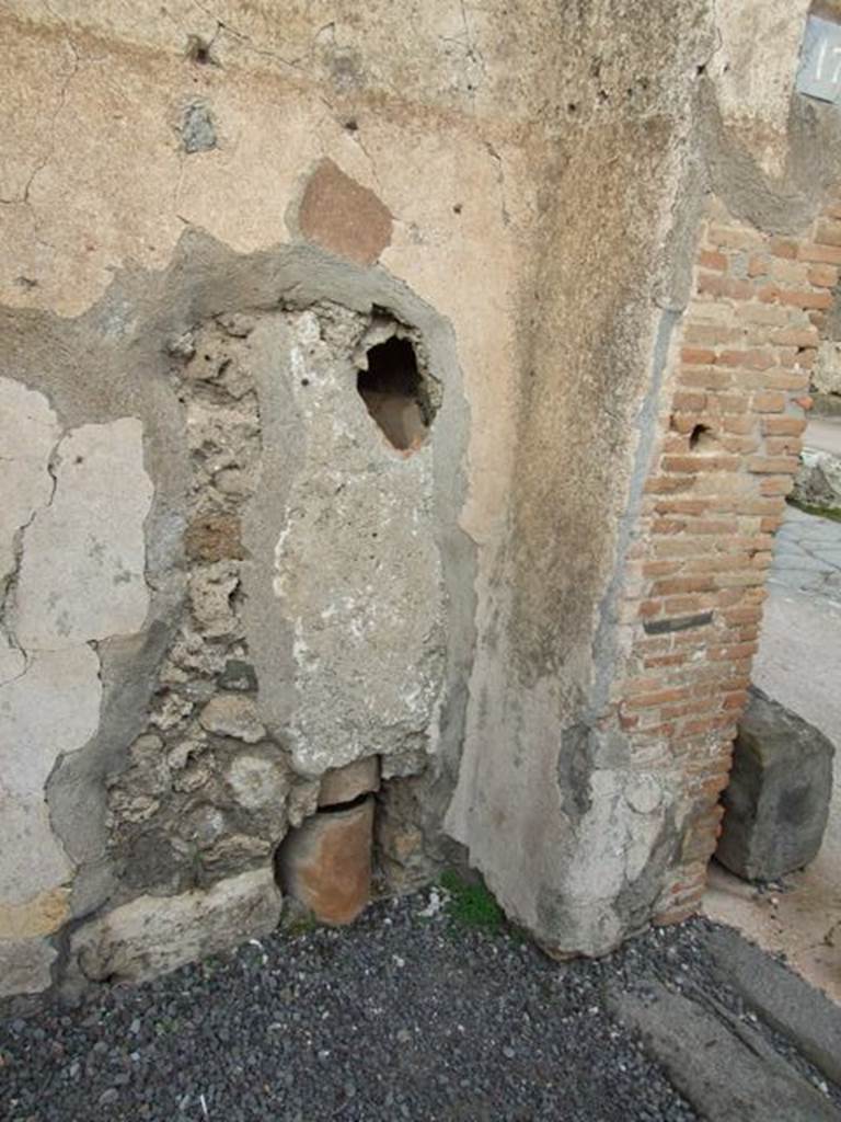 VI.8.17 Pompeii. December 2007. Waste pipe in north-east corner of shop.