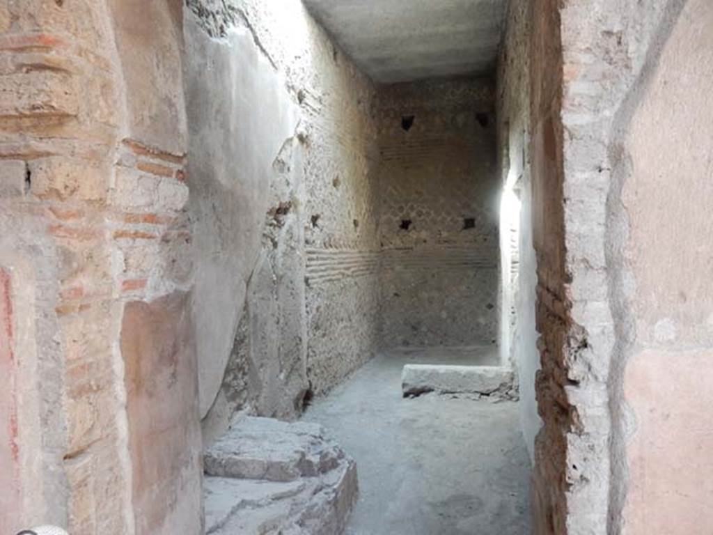 VI.8.24 Pompeii. May 2017. Looking west along corridor in south-west corner of atrium, leading to rear rooms and garden area of VI.8.23. Photo courtesy of Buzz Ferebee.
