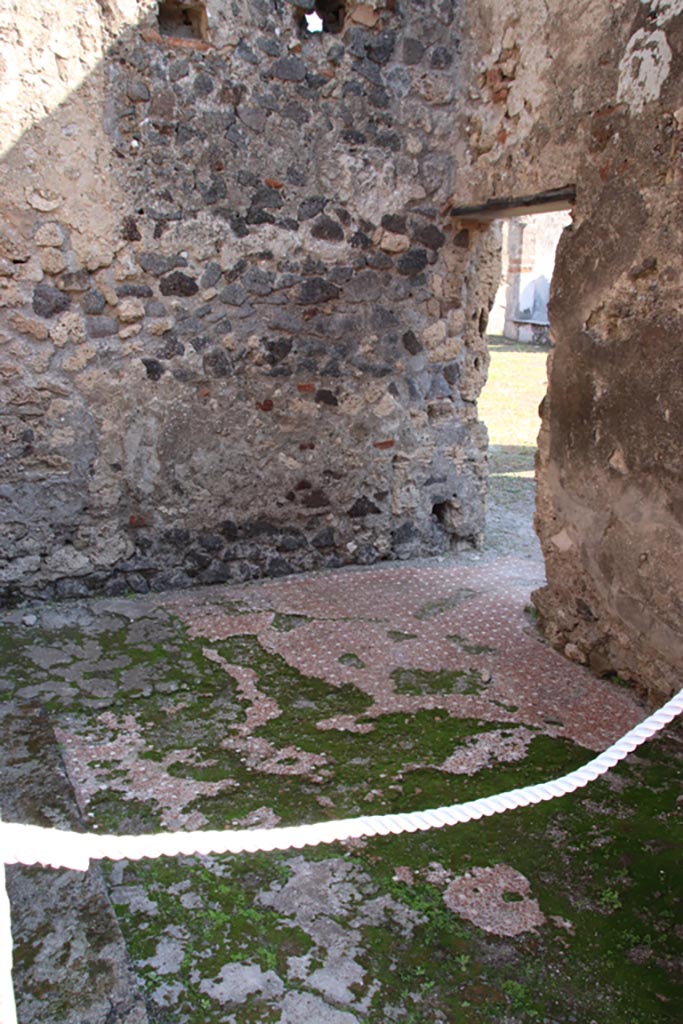 VI.9.4 Pompeii. October 2022. 
Room 15, looking towards south-east corner, and doorway in south wall into fauces 14 and atrium 16 of VI.9.5.  
Photo courtesy of Klaus Heese.

