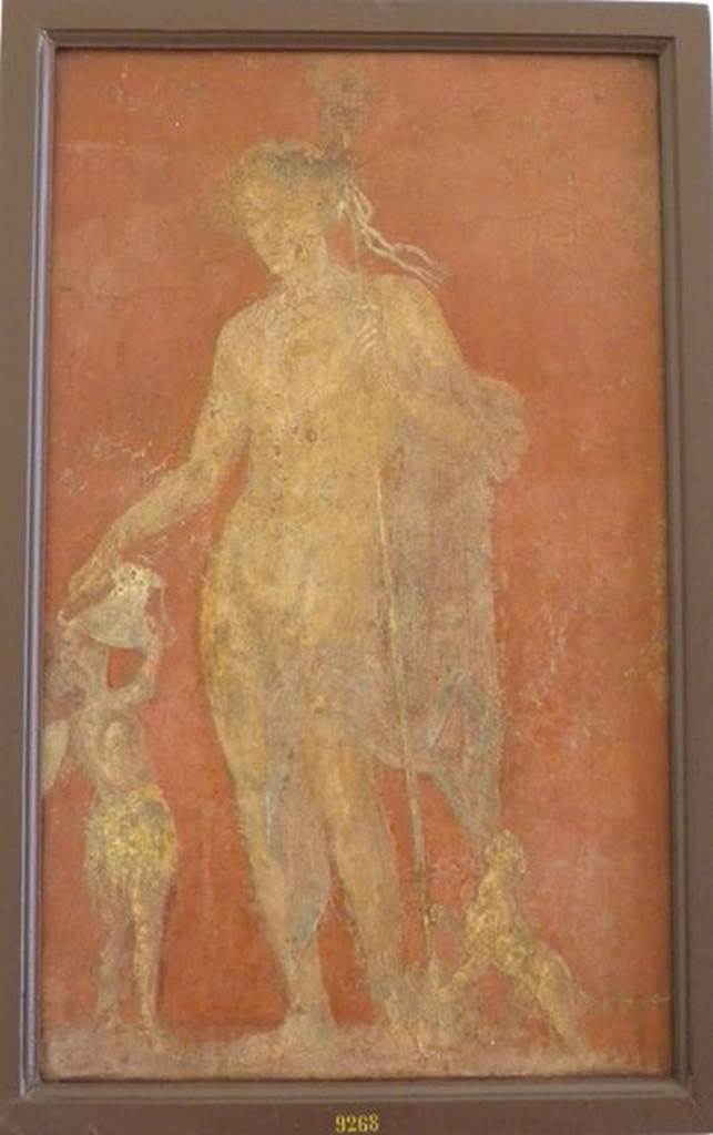 VI.9.6 Pompeii.  Found on 1st July 1828.  Wall painting of Dionysus or Bacchus with panther to his left and a Cantharus in his right hand from which a satyr is drinking.   One of various painted figures found on the walls of the atrium. See Helbig, W., 1868. Wandgemlde der vom Vesuv verschtteten Stdte Campaniens. Leipzig: Breitkopf und Hrtel. (400). Now in Naples Archaeological Museum.  Inventory number 9268.