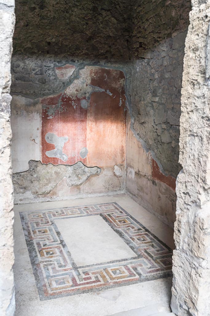 VI.9.6 Pompeii. January 2023. 
Room 12, looking through doorway towards coloured mosaic floor. Photo courtesy of Johannes Eber.

