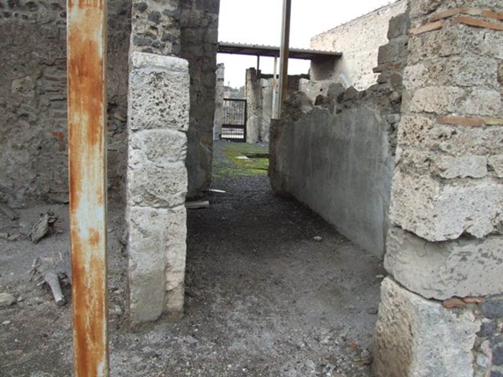 VI.9.7 Pompeii. March 2009. Room 11, corridor to atrium and front of house, looking west.