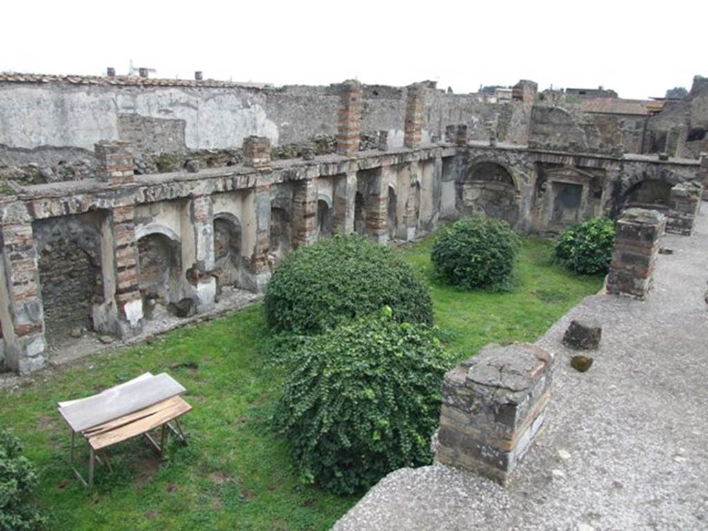 VI.10.7 Pompeii. March 2009. Looking south-east across portico level with garden below. According to Jashemski, this impressive peristyle garden, excavated in 1830, was reached by stairs down from the atrium.
See Jashemski, W. F., 1993. The Gardens of Pompeii, Volume II: Appendices. New York: Caratzas. (p.141)
